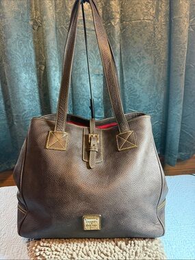 Dooney & Bourke Brown Leather Tote with Red Trim and Gold Hardware